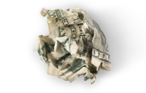 crumpled up dollar bill against white background