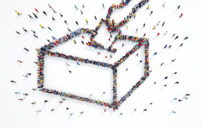 image of a hand placing a ballot into a ballot box. the hand is made up of many people coming together to form the outline of the image