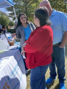 Engagement team talking with festival attendees